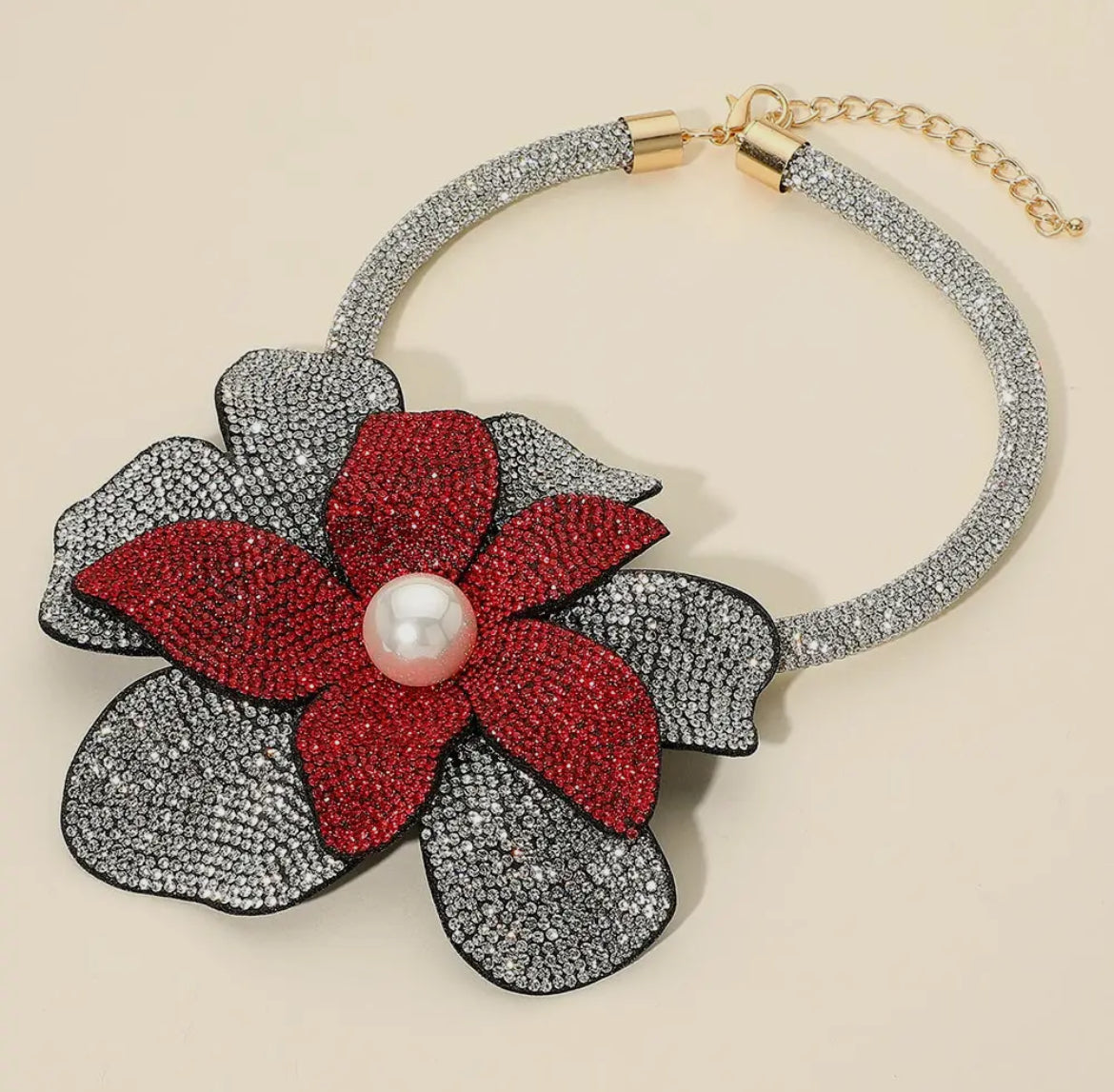 Oversized Bling Studded Flower with a Pearl in the middle necklace.