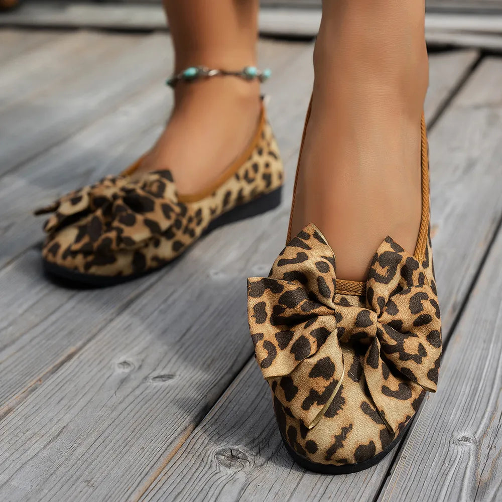 Mirage Platform Leopard Bow Flat Slip Ons