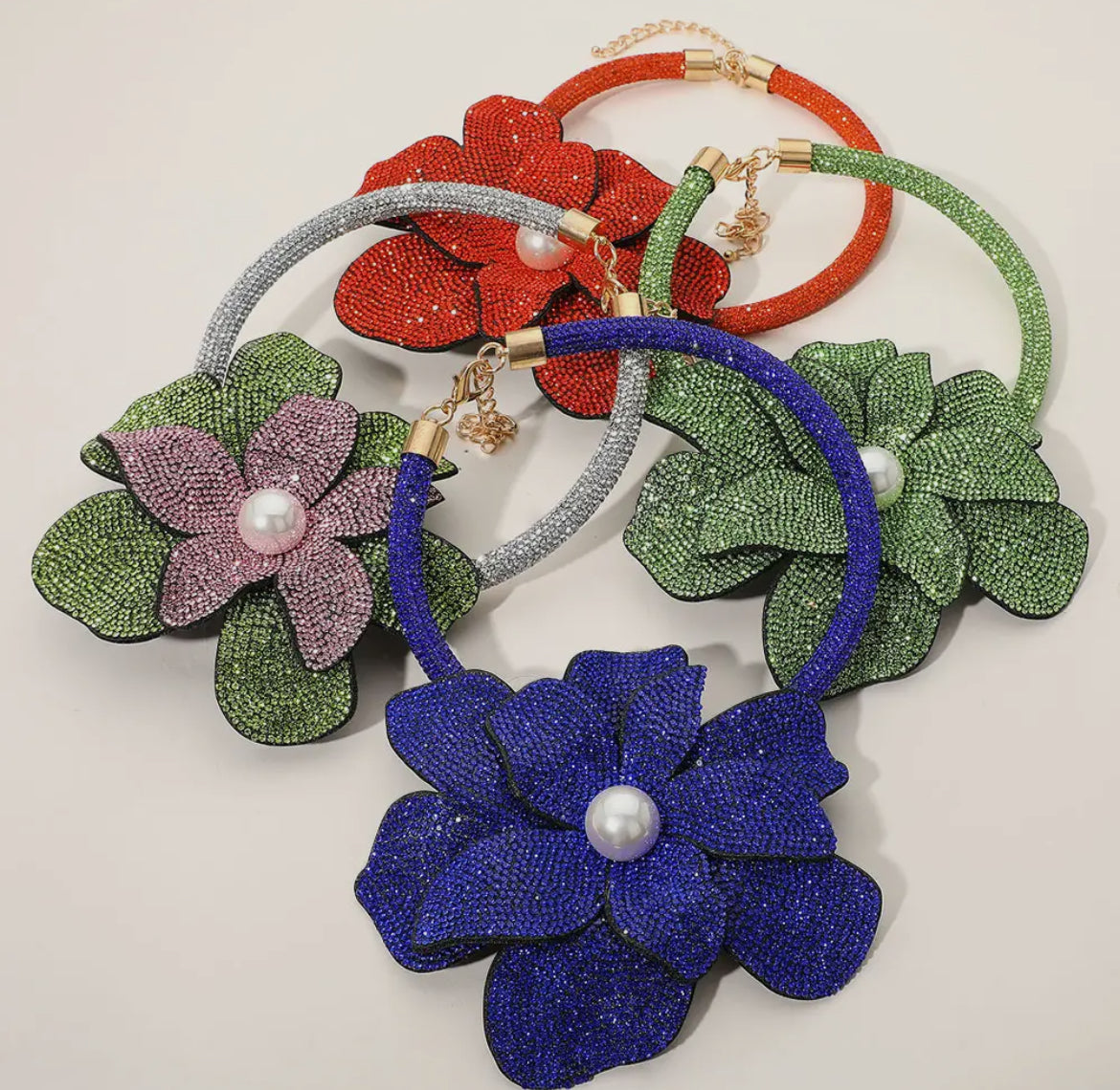 Oversized Bling Studded Flower with a Pearl in the middle necklace.