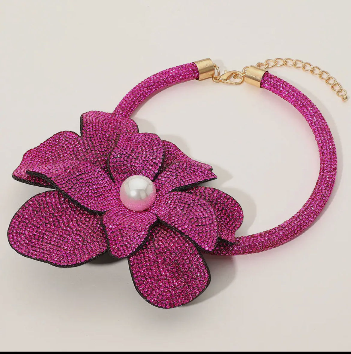 Oversized Bling Studded Flower with a Pearl in the middle necklace.