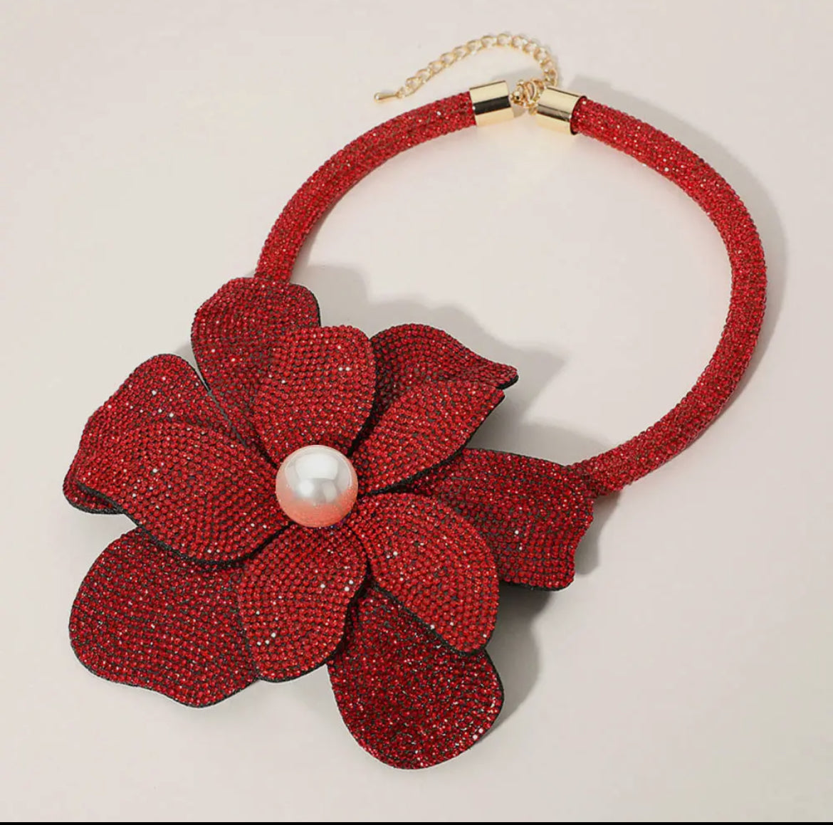 Oversized Bling Studded Flower with a Pearl in the middle necklace.