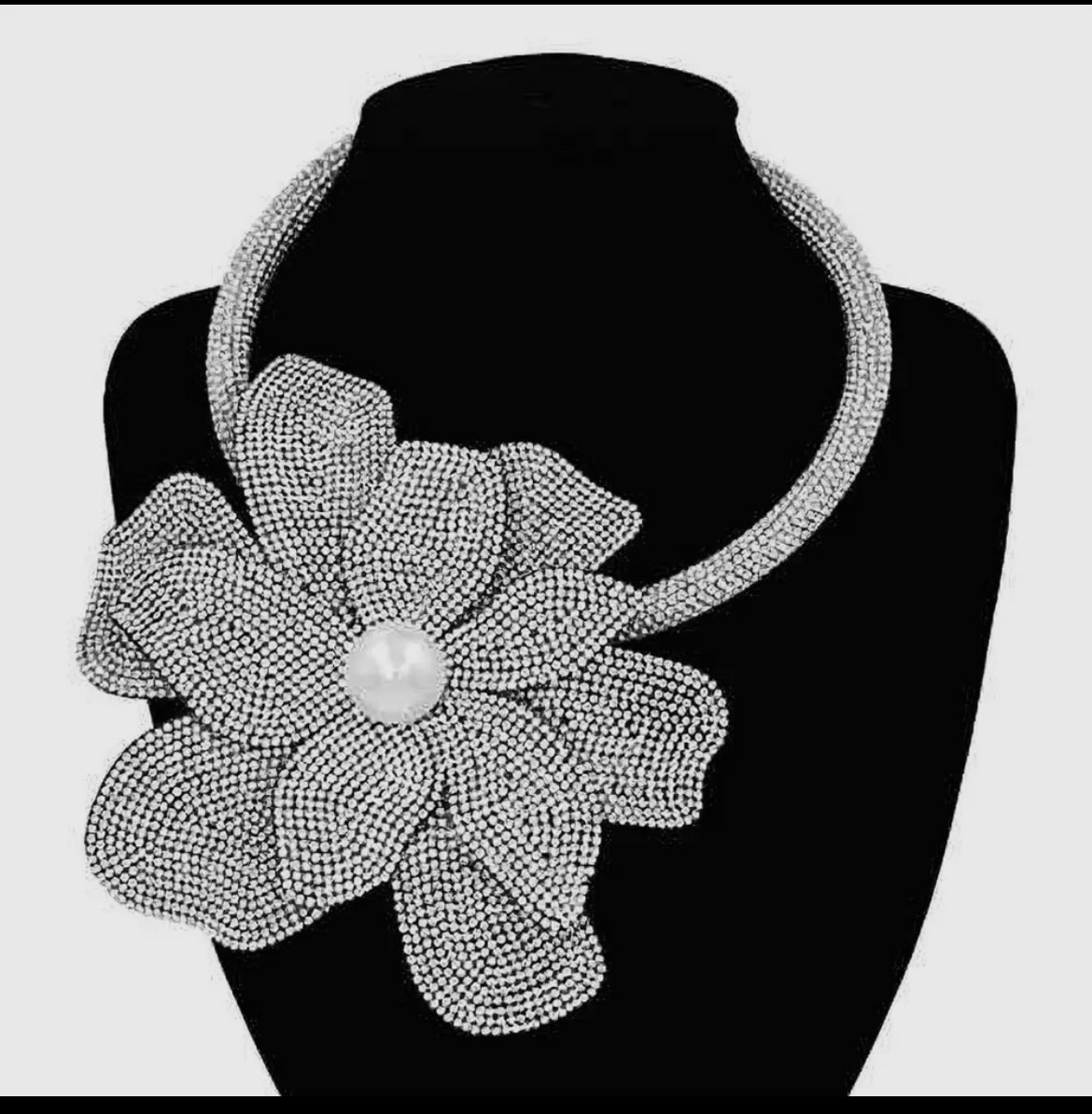 Oversized Bling Studded Flower with a Pearl in the middle necklace.