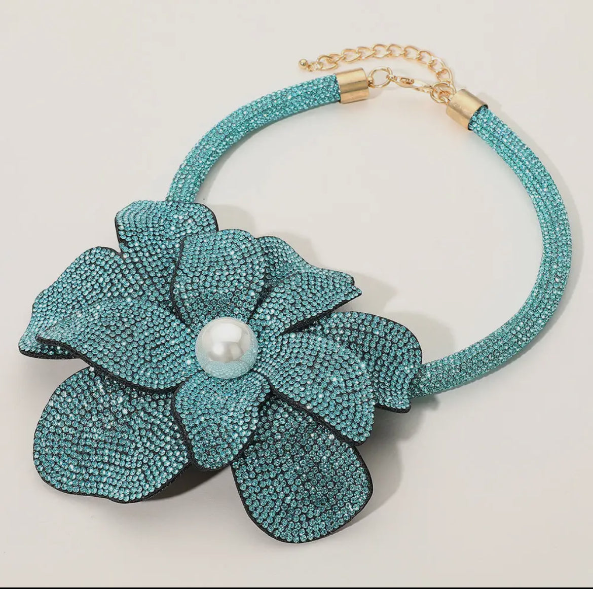 Oversized Bling Studded Flower with a Pearl in the middle necklace.